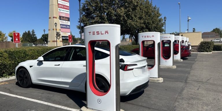 Tesla vehicles at a Supercharger station in Manteca, California