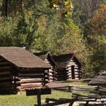 Reconstructed Continental Army log huts at Valley Forge National Historical Park in fall